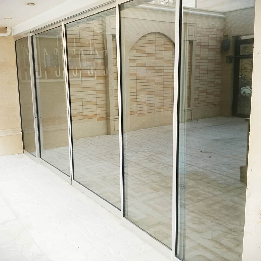 نصب درب شیشه ای لمینت اتوماتیک تک لت در ساری