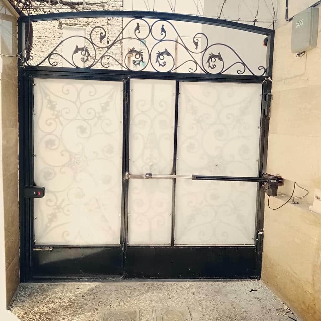 سفارش جک درب پارکینگ بی صدا متناسب با وزن درب در ساری